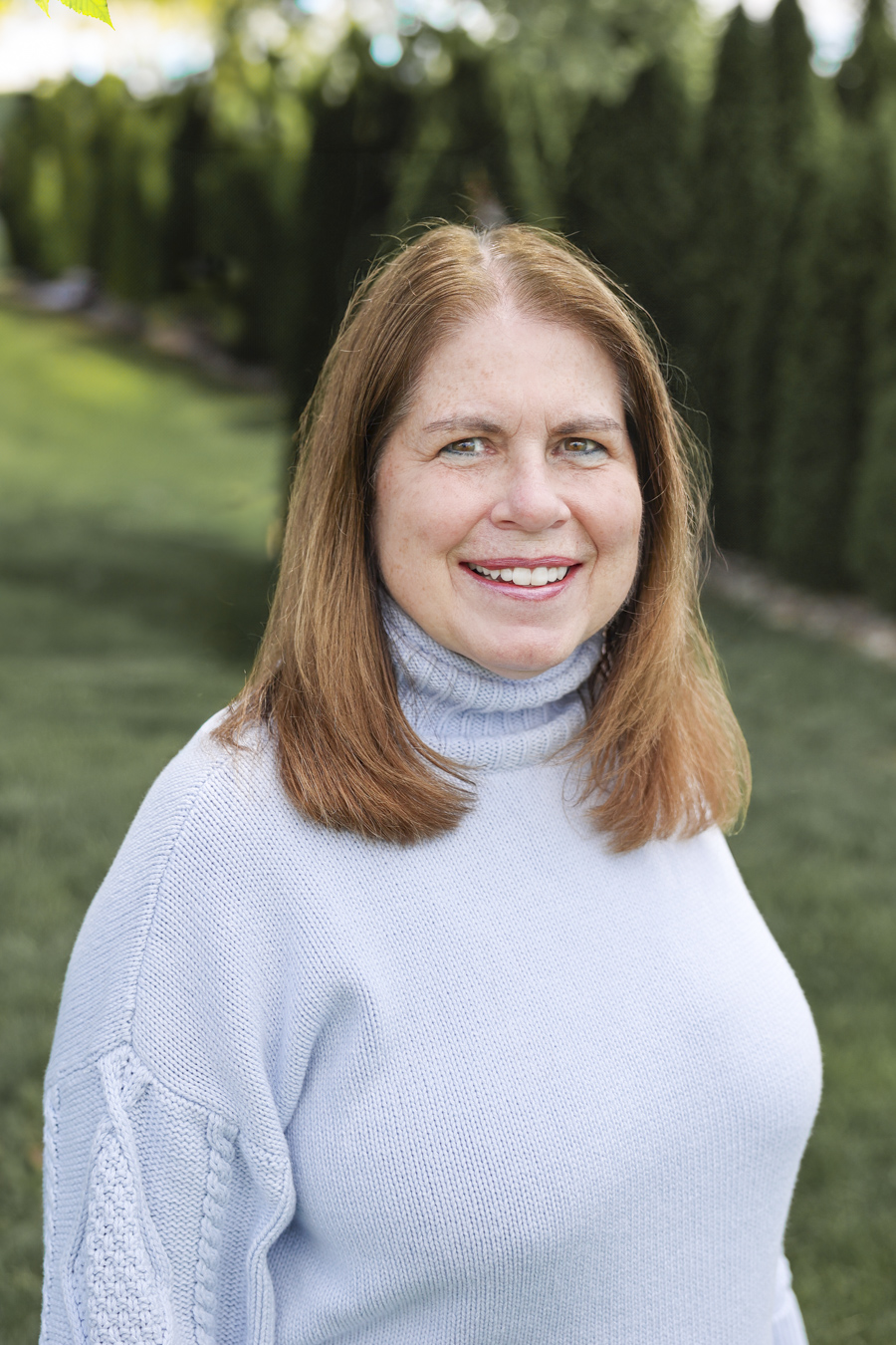 Nancy Estep Smiling woman standing outdoors